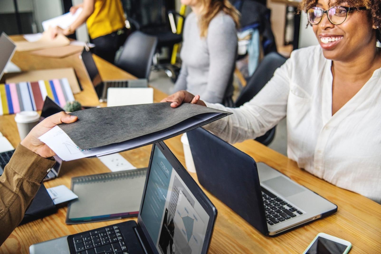 Financial planning workspace with charts and documents